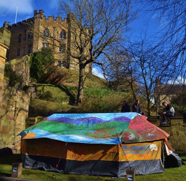 ©Hannah Rose Thomas One of the tents painted by Syrian refugees is exhibited to the public against the backdrop of Durham Castle, originally built in the 11th Century.